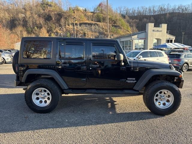 used 2013 Jeep Wrangler Unlimited car, priced at $14,700
