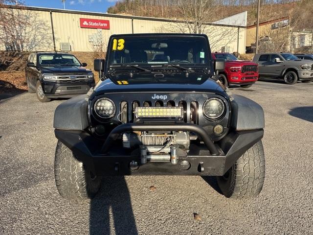 used 2013 Jeep Wrangler Unlimited car, priced at $14,700
