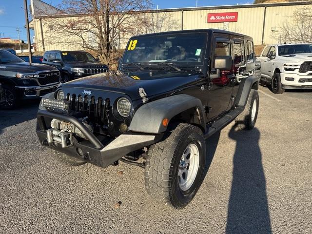 used 2013 Jeep Wrangler Unlimited car, priced at $14,700
