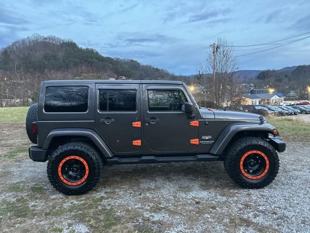used 2014 Jeep Wrangler Unlimited car, priced at $15,500