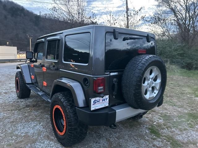 used 2014 Jeep Wrangler Unlimited car, priced at $15,500