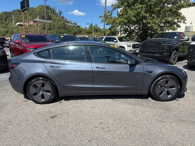 used 2023 Tesla Model 3 car, priced at $27,500