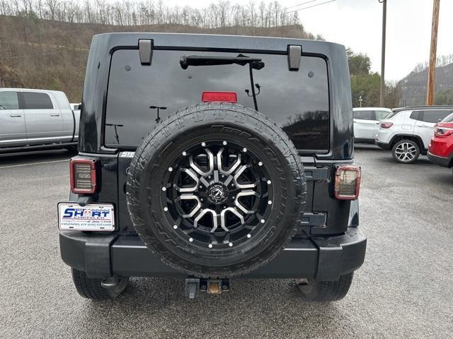 used 2013 Jeep Wrangler Unlimited car, priced at $13,500