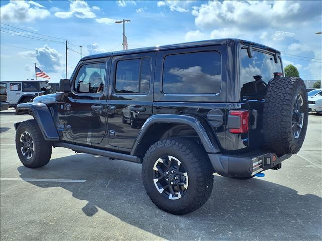 used 2024 Jeep Wrangler car, priced at $46,980