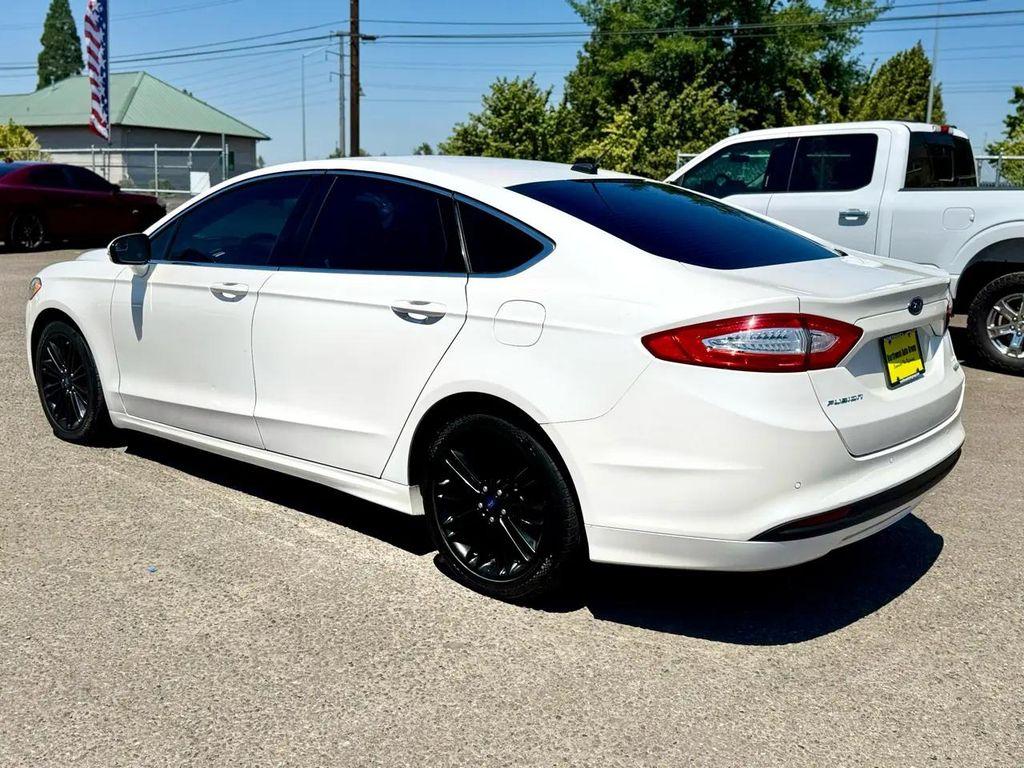 used 2016 Ford Fusion car, priced at $12,980