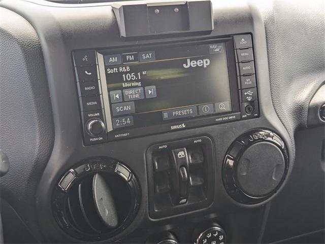 used 2016 Jeep Wrangler Unlimited car, priced at $15,993