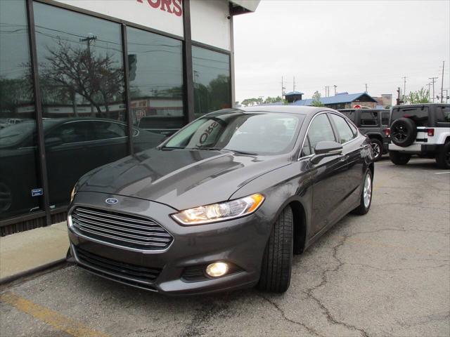used 2016 Ford Fusion car, priced at $10,495