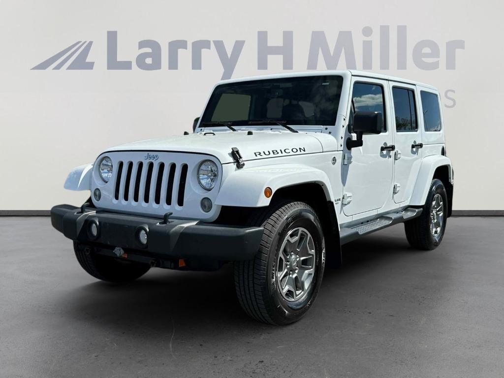 used 2015 Jeep Wrangler Unlimited car, priced at $23,874