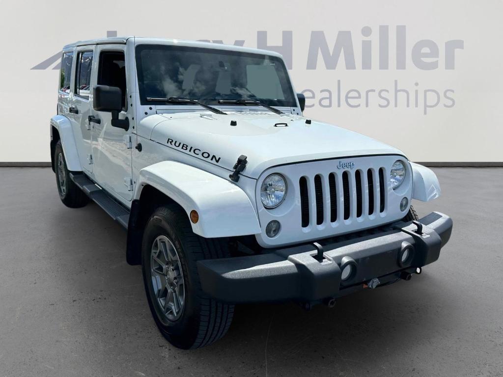 used 2015 Jeep Wrangler Unlimited car, priced at $23,874