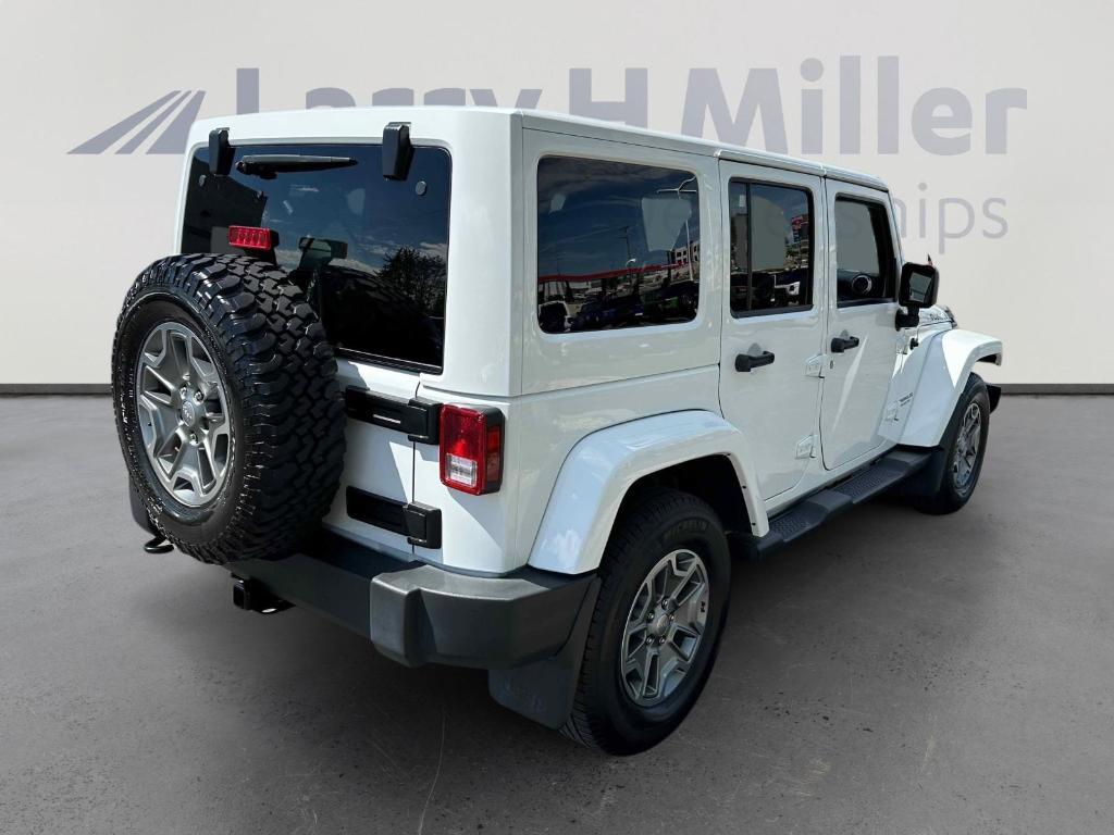 used 2015 Jeep Wrangler Unlimited car, priced at $23,874