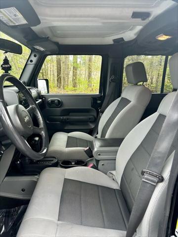 used 2010 Jeep Wrangler Unlimited car, priced at $13,000