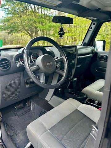 used 2010 Jeep Wrangler Unlimited car, priced at $13,000