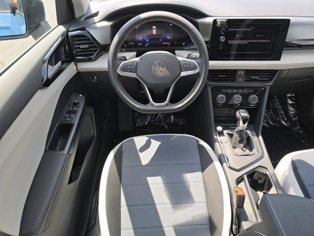 new 2025 Volkswagen Taos car, priced at $22,659