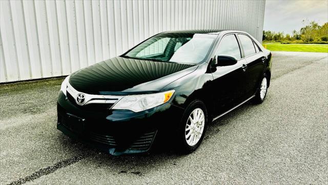 used 2013 Toyota Camry car, priced at $12,886