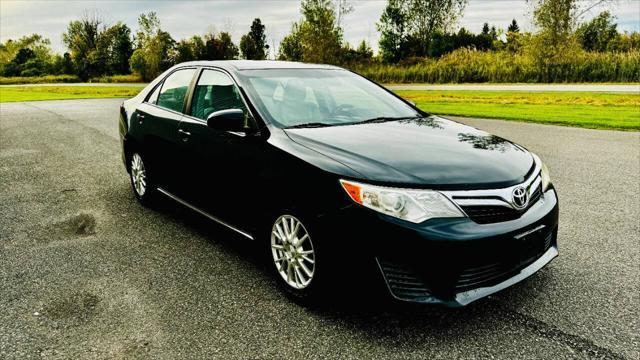 used 2013 Toyota Camry car, priced at $12,886