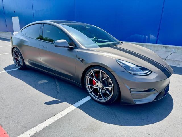 used 2022 Tesla Model 3 car, priced at $31,300