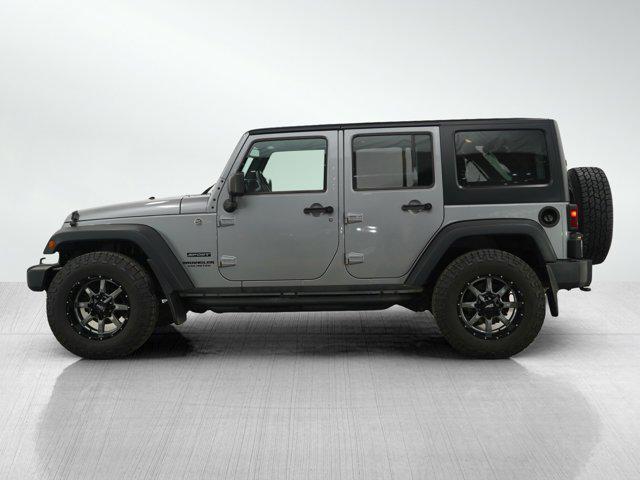 used 2014 Jeep Wrangler Unlimited car, priced at $16,499