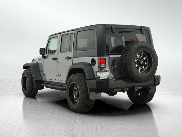 used 2014 Jeep Wrangler Unlimited car, priced at $16,499