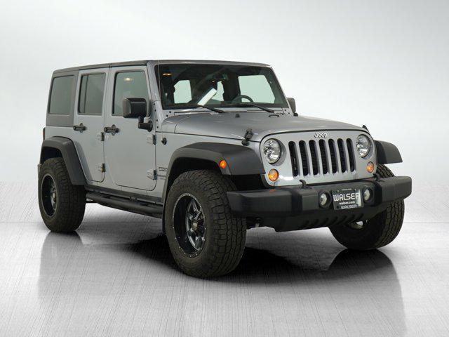 used 2014 Jeep Wrangler Unlimited car, priced at $16,499