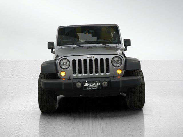 used 2014 Jeep Wrangler Unlimited car, priced at $16,499