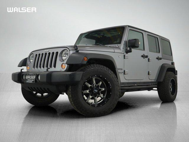 used 2014 Jeep Wrangler Unlimited car, priced at $16,499