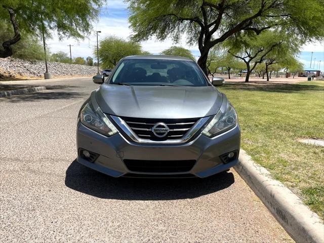 used 2016 Nissan Altima car, priced at $9,995