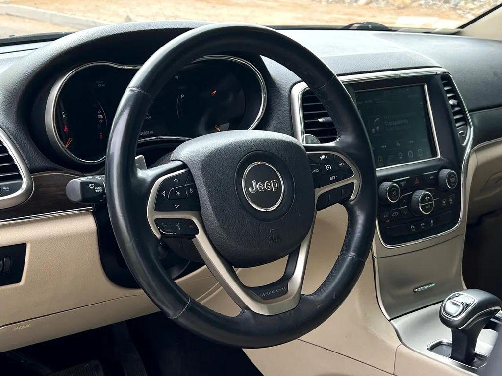 used 2014 Jeep Grand Cherokee car, priced at $11,995