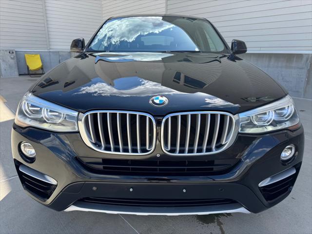 used 2015 BMW X4 car, priced at $15,950