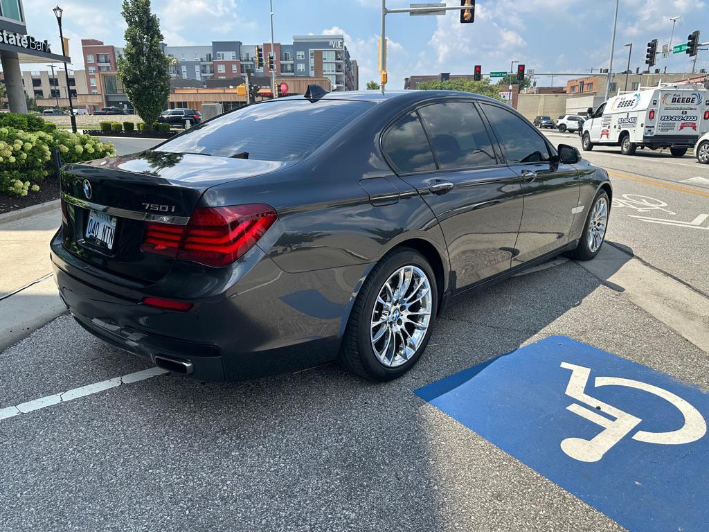 used 2015 BMW 750 car, priced at $16,950