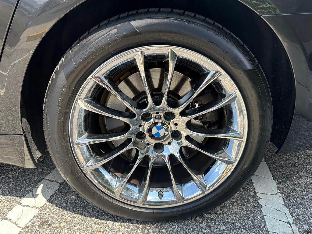 used 2015 BMW 750 car, priced at $16,950