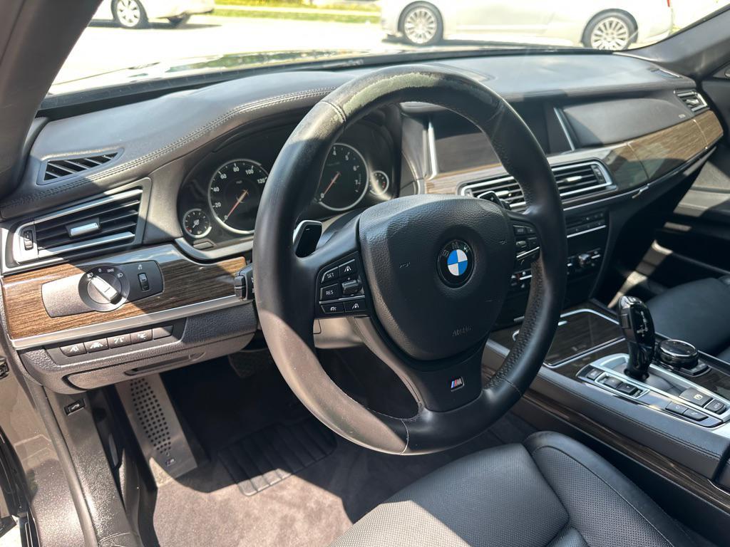 used 2015 BMW 750 car, priced at $16,950