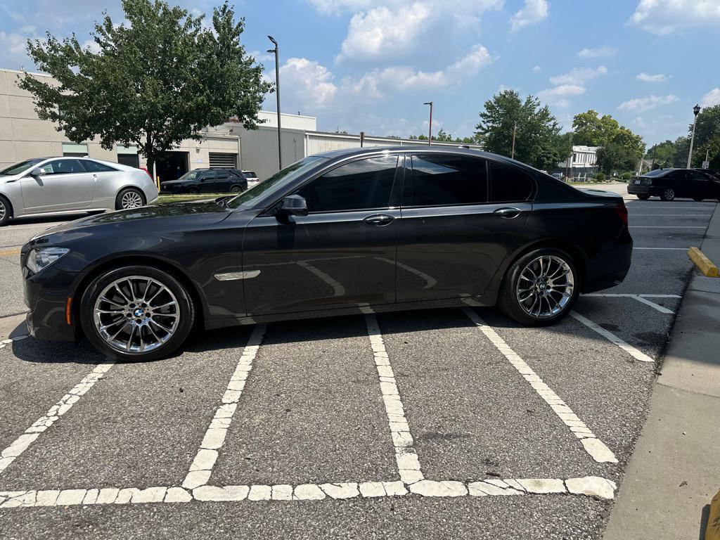 used 2015 BMW 750 car, priced at $16,950