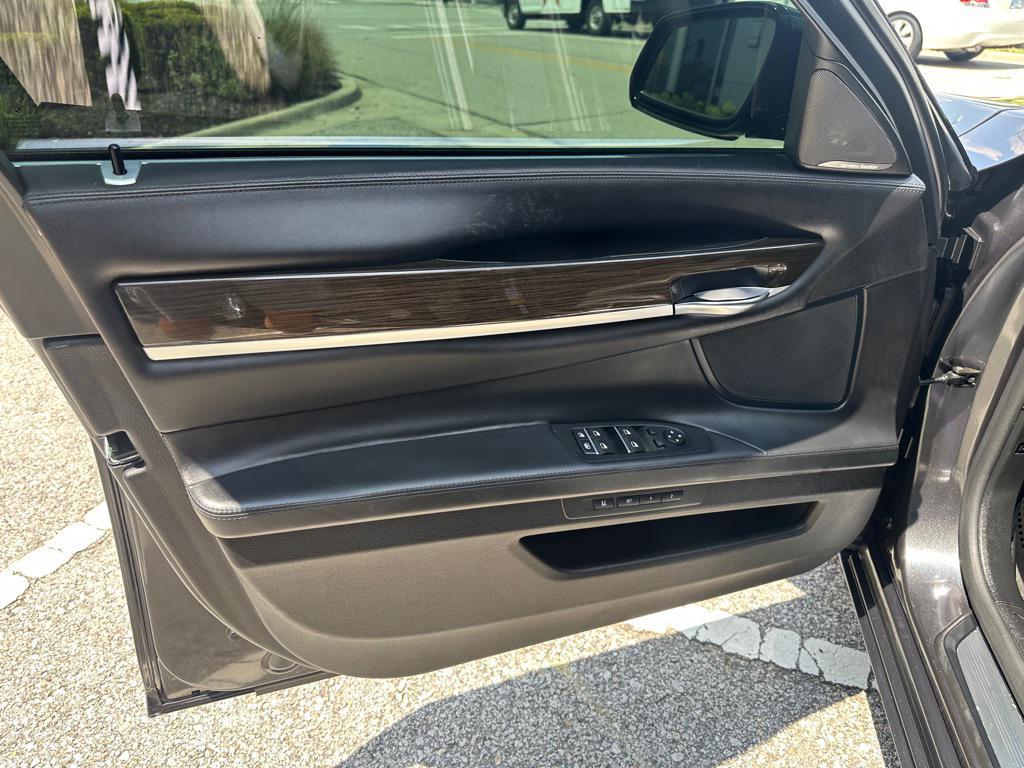 used 2015 BMW 750 car, priced at $16,950