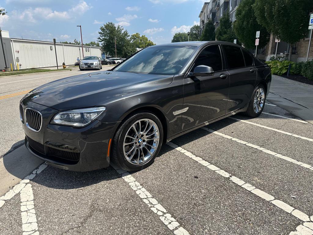 used 2015 BMW 750 car, priced at $16,950