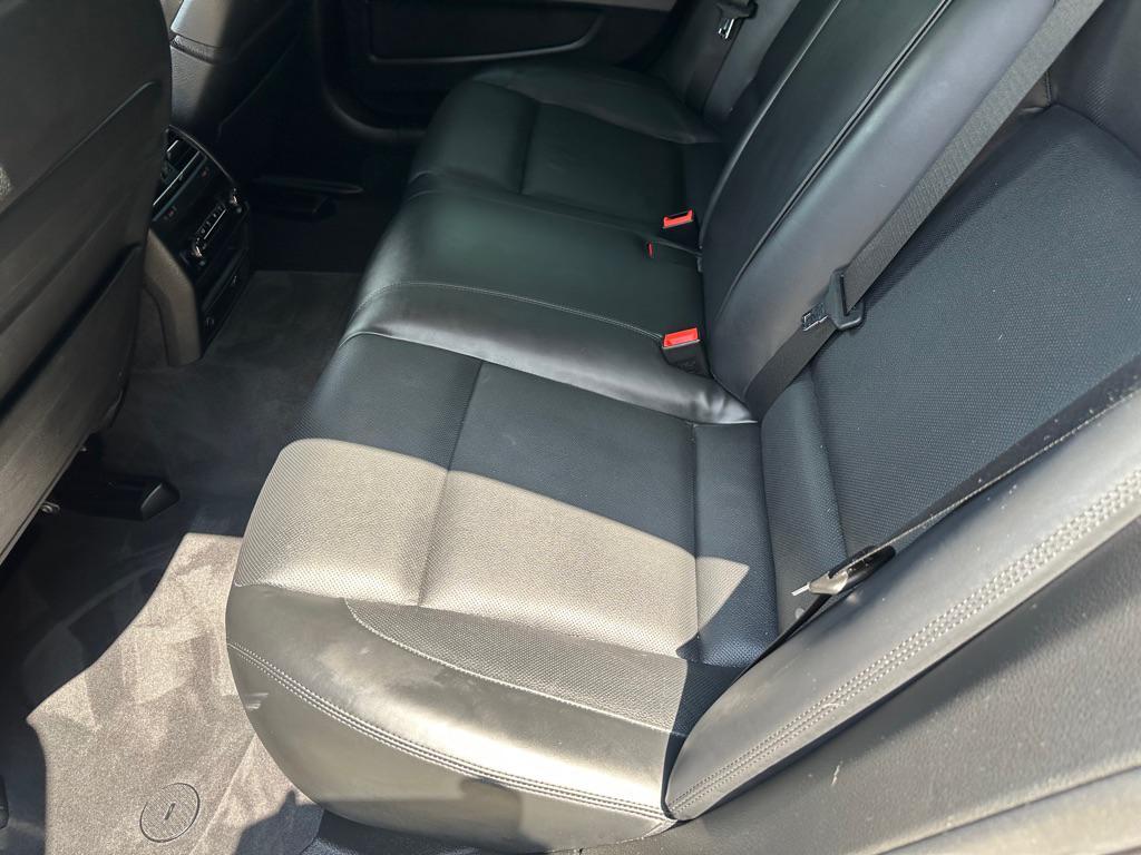 used 2015 BMW 750 car, priced at $16,950