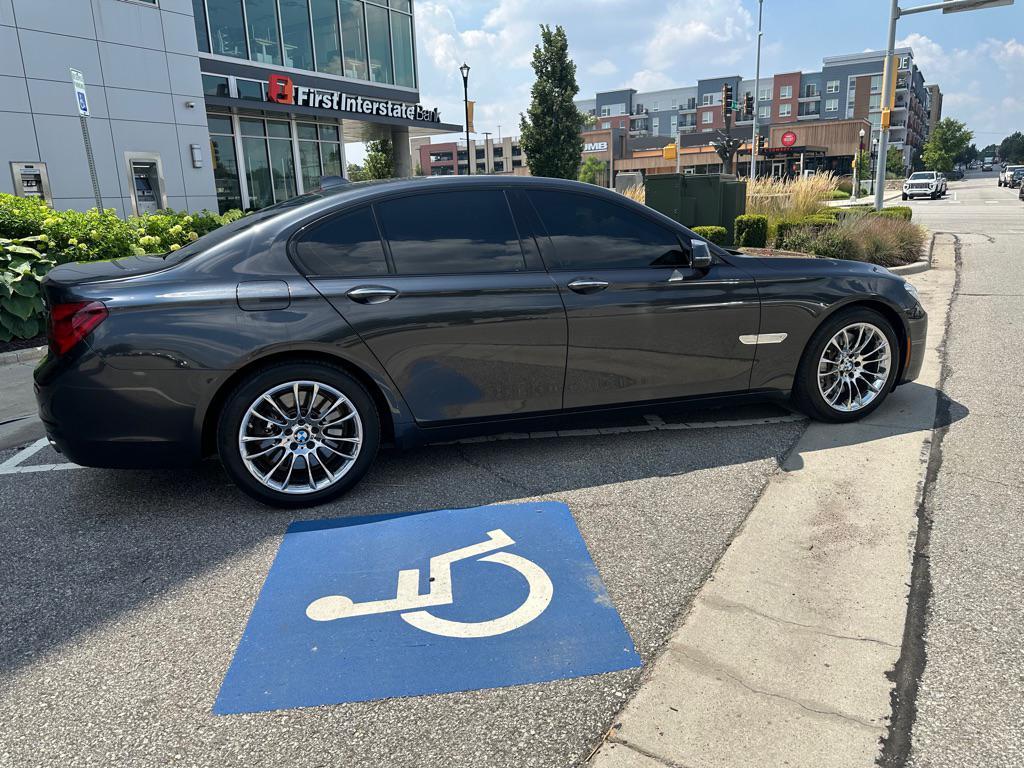 used 2015 BMW 750 car, priced at $16,950
