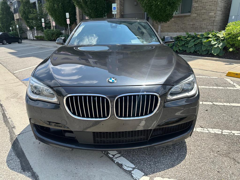 used 2015 BMW 750 car, priced at $16,950