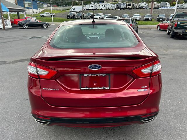 used 2016 Ford Fusion car, priced at $19,495