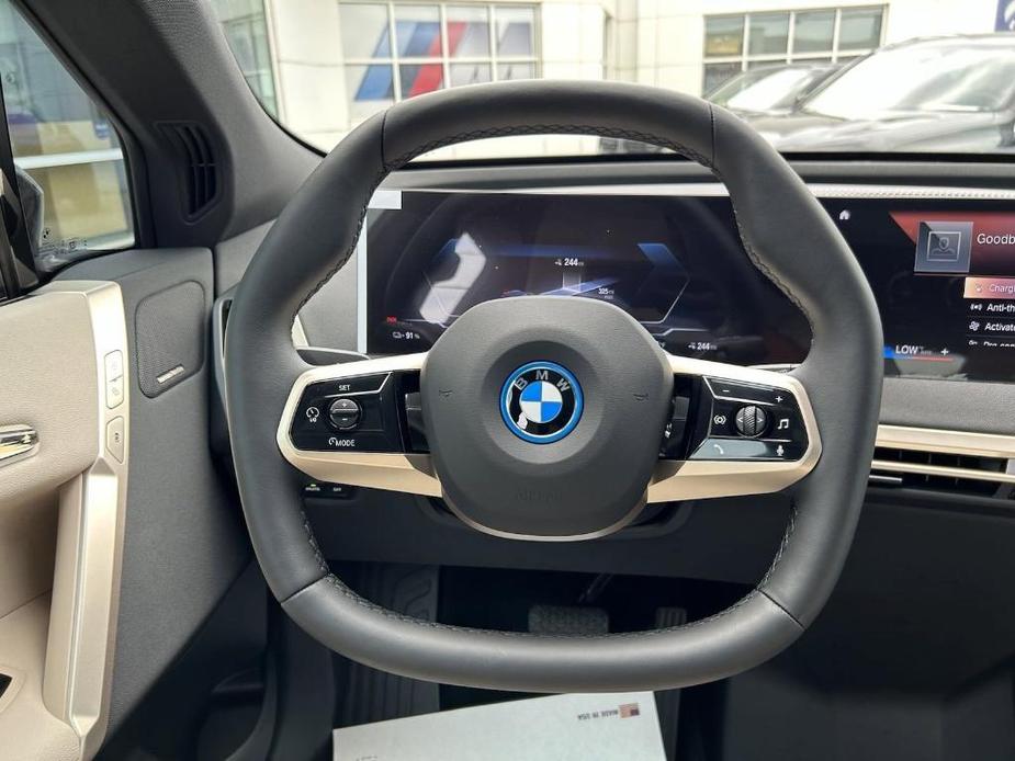 used 2024 BMW iX car, priced at $79,900