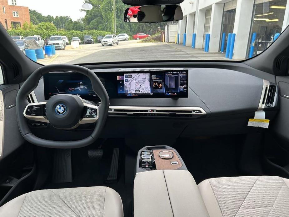 used 2024 BMW iX car, priced at $82,900