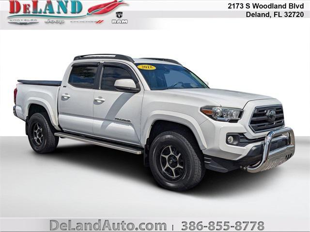used 2018 Toyota Tacoma car, priced at $28,286