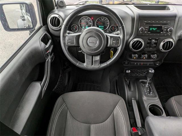 used 2014 Jeep Wrangler Unlimited car, priced at $25,000