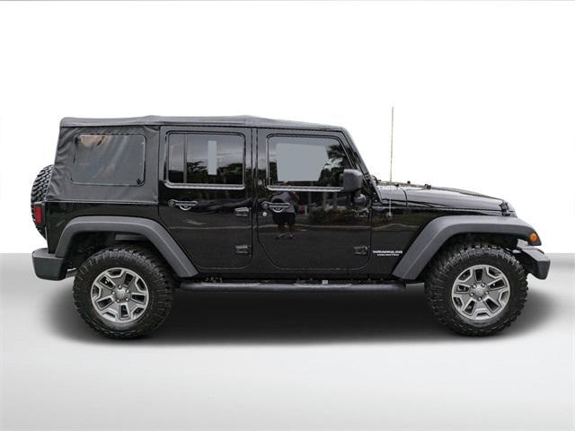 used 2014 Jeep Wrangler Unlimited car, priced at $25,000