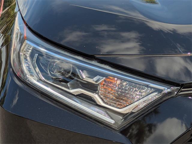 used 2021 Toyota RAV4 Hybrid car, priced at $29,500
