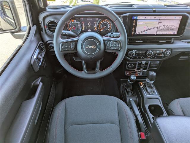 used 2024 Jeep Wrangler car, priced at $49,193