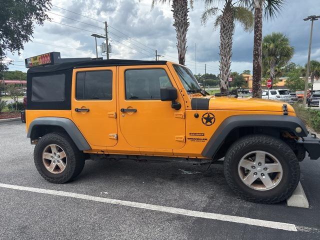 used 2013 Jeep Wrangler Unlimited car, priced at $9,950