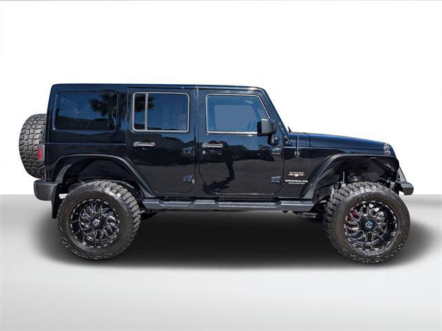 used 2016 Jeep Wrangler Unlimited car, priced at $22,494