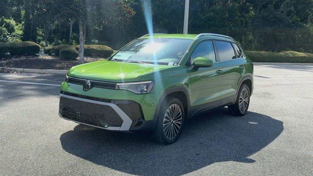new 2025 Volkswagen Taos car, priced at $29,328