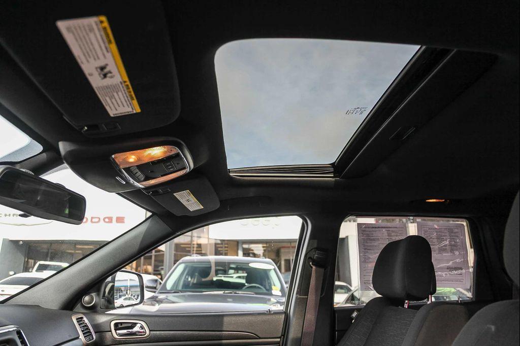 used 2015 Jeep Grand Cherokee car, priced at $12,499