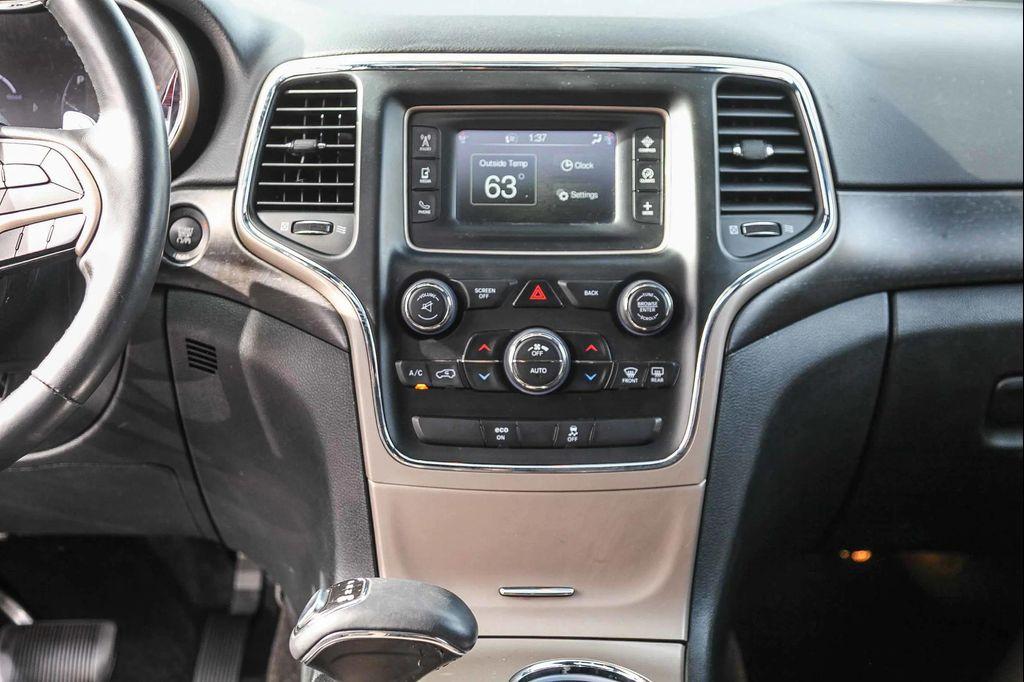 used 2015 Jeep Grand Cherokee car, priced at $12,499